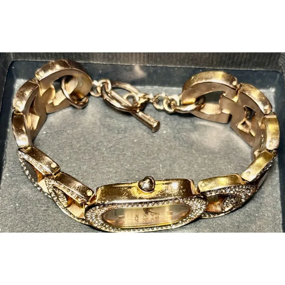 JLo by Jennifer Lopez Gold-Tone Oval Crystal Watch